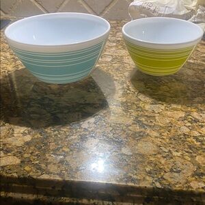 Vintage Charm Pyrex Inspired Ceramic Bowl in Aqua Stripe and Avocado Stripe.